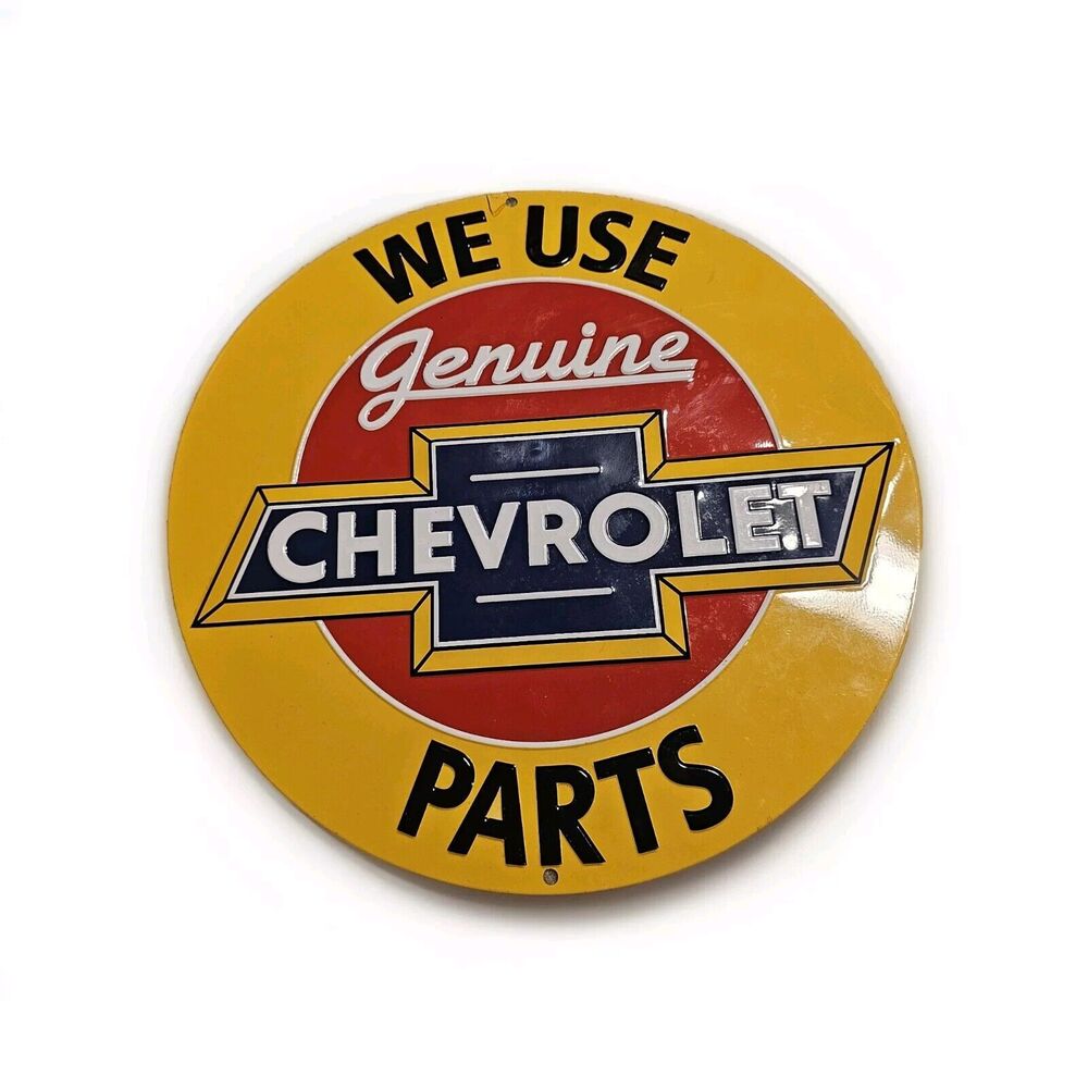 Metal Chevrolet Parts Advertising Sign 14" Embossed Round "We Use Genuine Parts"